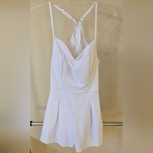 Medium Francesca's white romper new with tags